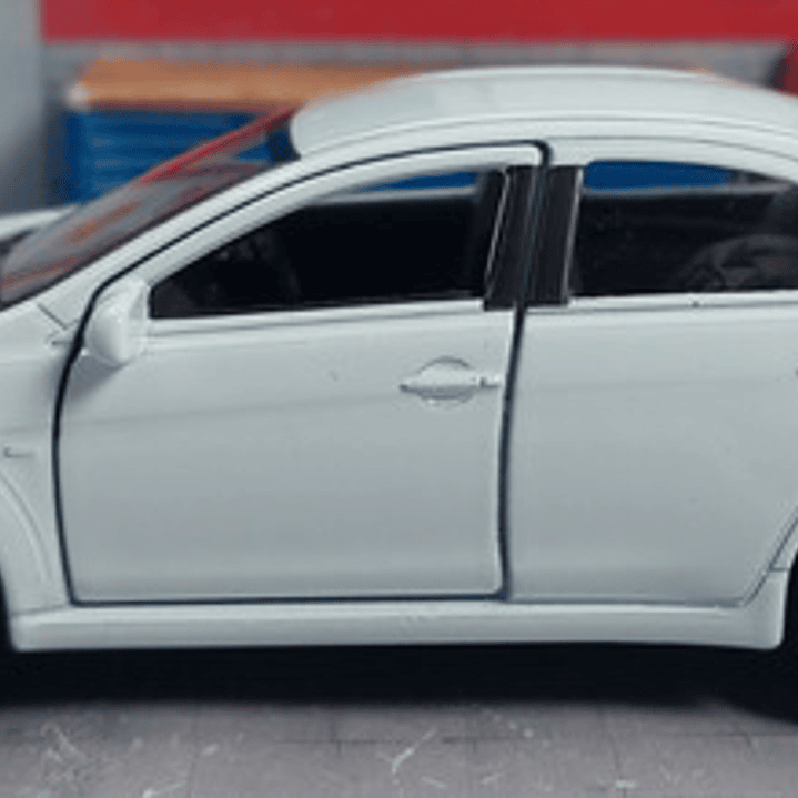 Mitsubishi Lancer Evolution X blanco 1/36, Kinsmart 5