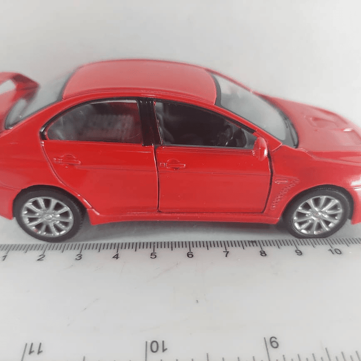 Mitsubishi Lancer Evolution X rojo 1/36, Kinsmart 4