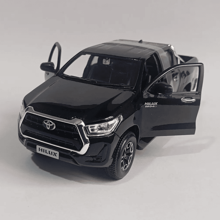 Toyota hilux negra ESCALA 1-24 marca maisto 1