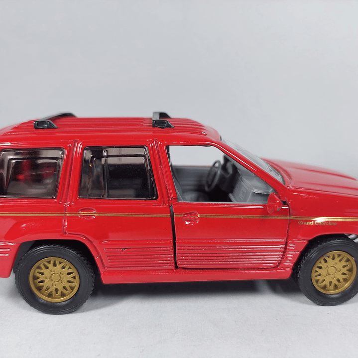 Jeep gran Cherokee marca sunny escala 1/32 2