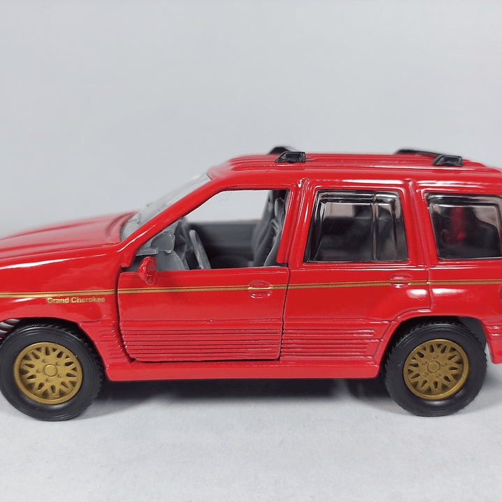 Jeep gran Cherokee marca sunny escala 1/32 6