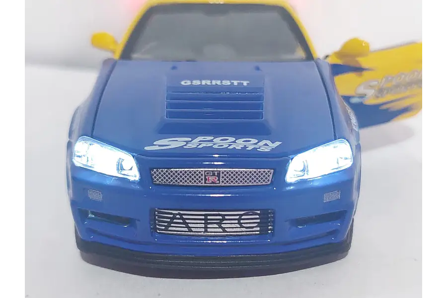 Nissan Skyline GT-R AZUL Y AMARILLO Escala 1-32 LEDS
