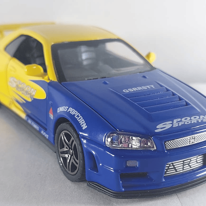 Nissan Skyline GT-R AZUL Y AMARILLO Escala 1-32 LEDS 6