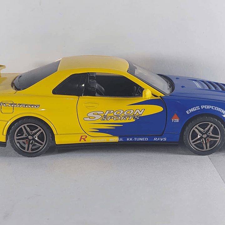 Nissan Skyline GT-R AZUL Y AMARILLO Escala 1-32 LEDS 8