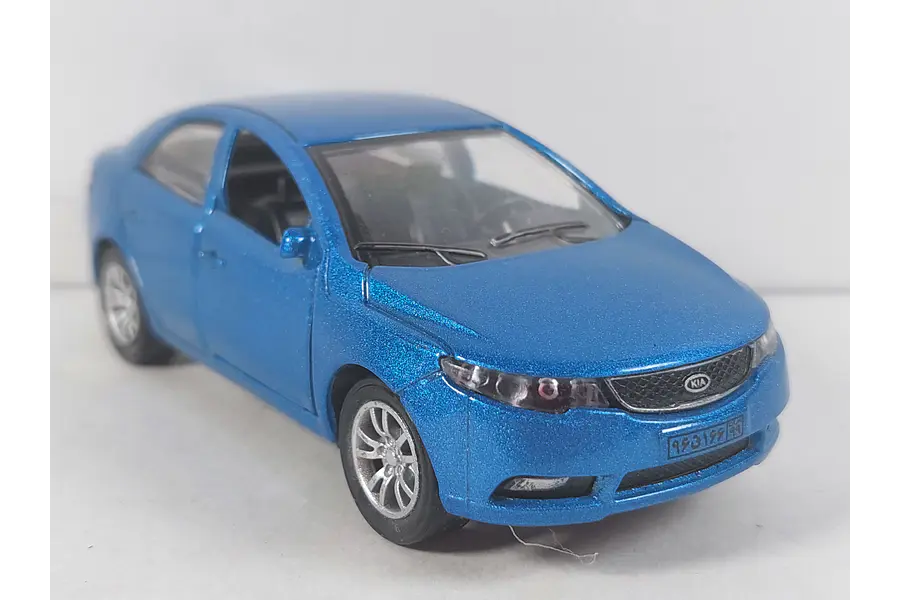 Kia cerato azul Escala 1/36 con luces LED