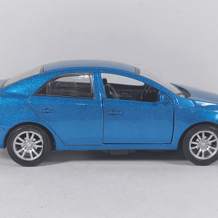 Kia cerato azul Escala 1/36 con luces LED 5