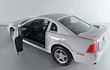 FORD MUSTANG  GT 1999 blanco marca Welly, Escala 1-32