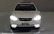 Chevrolet Optra 1/36 Chino Luces LED Gris