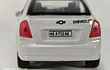 Chevrolet Optra 1/36 Chino Luces LED Gris