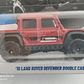 LAND ROVER DEFENDER Double Cab 1975 hot Wheels, Escala 1-64 - Miniatura 2