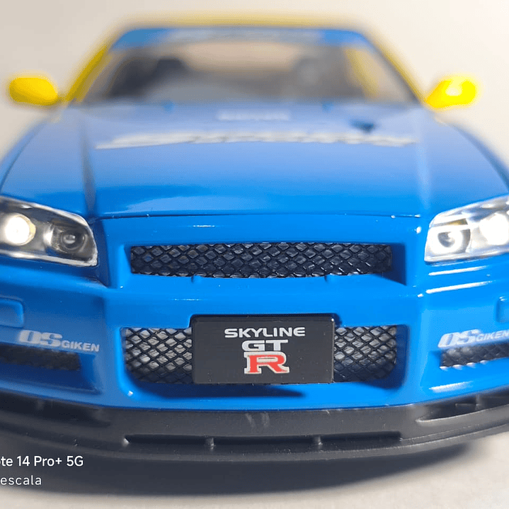 Nissan Skyline Gtr  ESCALA 1:24 MARCA JINLIFANG, AMARILLO  2