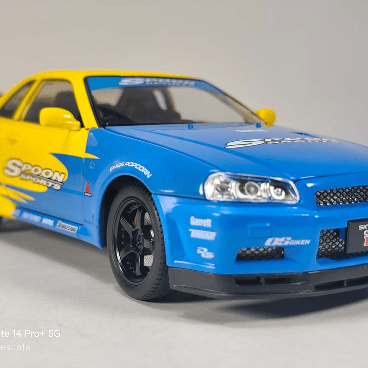 Nissan Skyline Gtr  ESCALA 1:24 MARCA JINLIFANG, AMARILLO  1