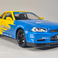 Nissan Skyline Gtr  ESCALA 1:24 MARCA JINLIFANG, AMARILLO  - Miniatura 1