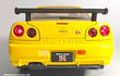 Nissan Skyline Gtr  ESCALA 1:24 MARCA JINLIFANG, AMARILLO 