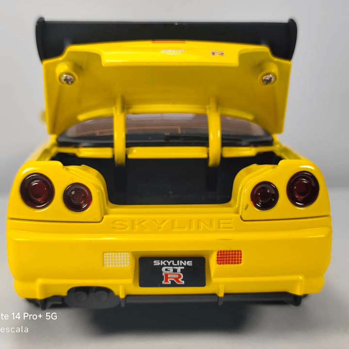 Nissan Skyline Gtr  ESCALA 1:24 MARCA JINLIFANG, AMARILLO  7