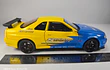 Nissan Skyline Gtr  ESCALA 1:24 MARCA JINLIFANG, AMARILLO 