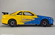 Nissan Skyline Gtr  ESCALA 1:24 MARCA JINLIFANG, AMARILLO 
