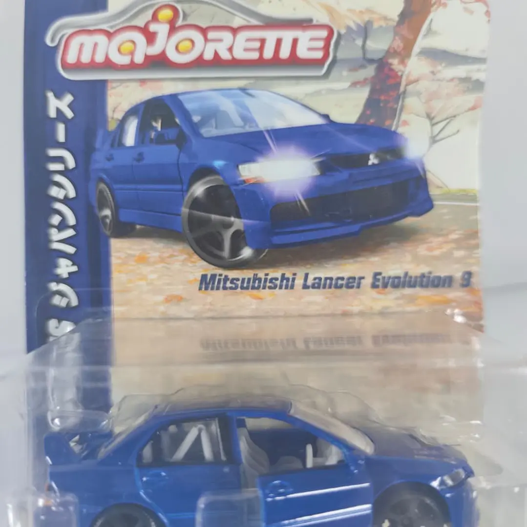 Mitsubishi Lancer Evolution , majorette Escala 1-64 1