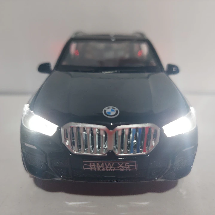BMW X5 Negro marca Newao, Escala 1-32 LEDS 4