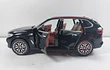 BMW X5 Negro marca Newao, Escala 1-32 LEDS