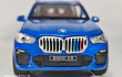 BMW X5 Azul marca Newao, Escala 1-32 LEDS