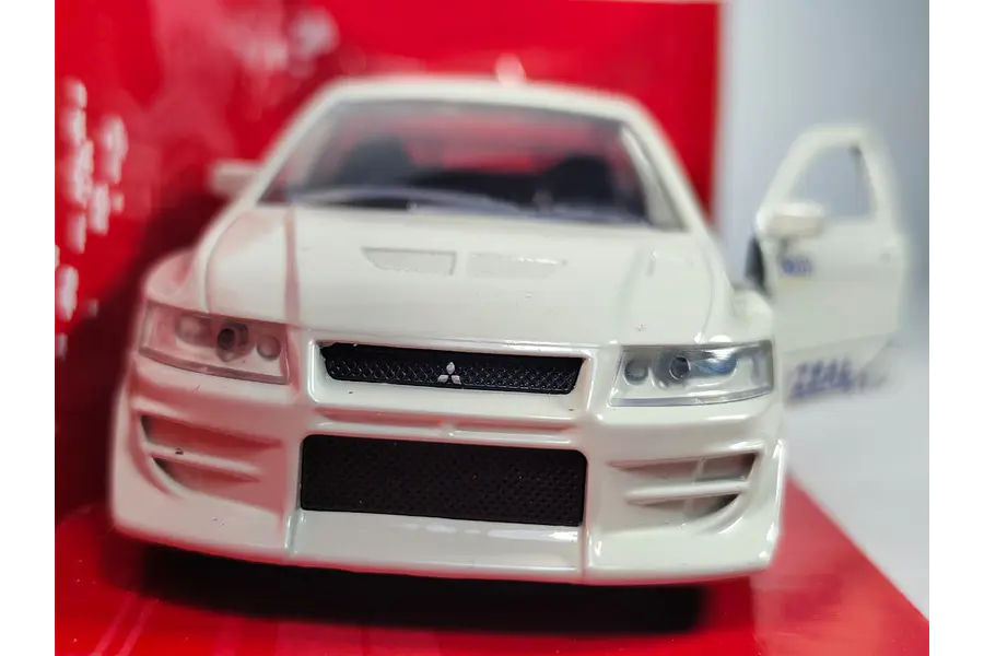 Mitsubishi Lancer Evolution VII, blanco Jada, Escala 1-32