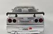 NISSAN SKYLINE GT R 34 PLATEADO , ESCALA 1/32, MARCA JADA