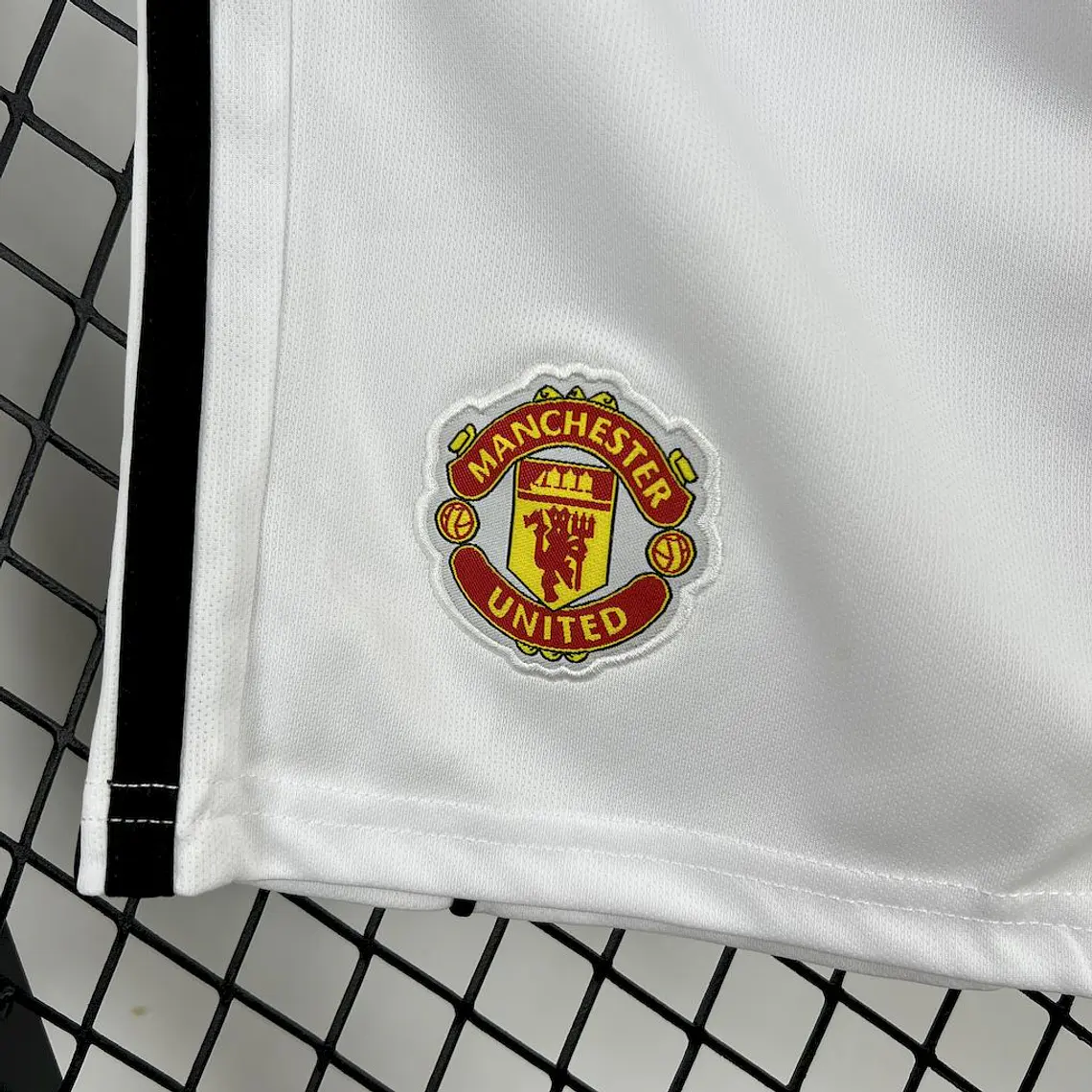 Manchester United Home 25/26 Kit Criança 9