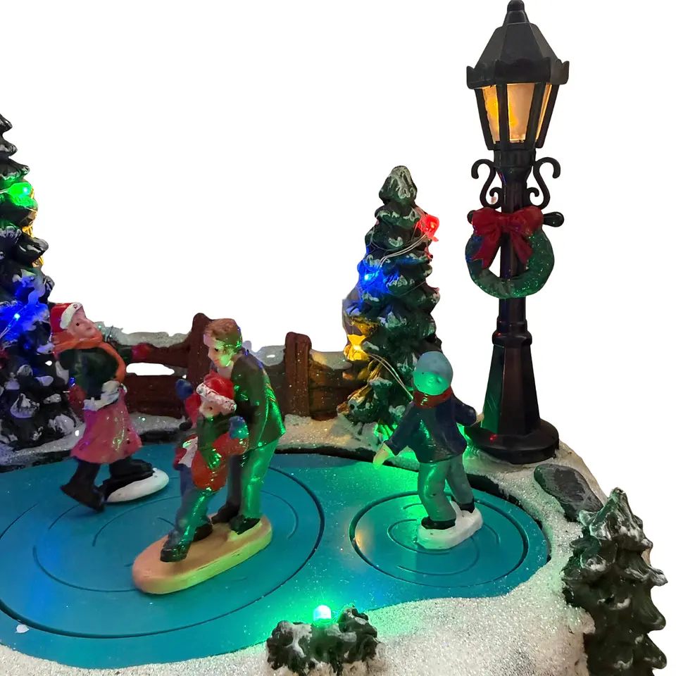 Villa Navideña Pista de Patinaje Musical LED con Movimiento 25 cm 5
