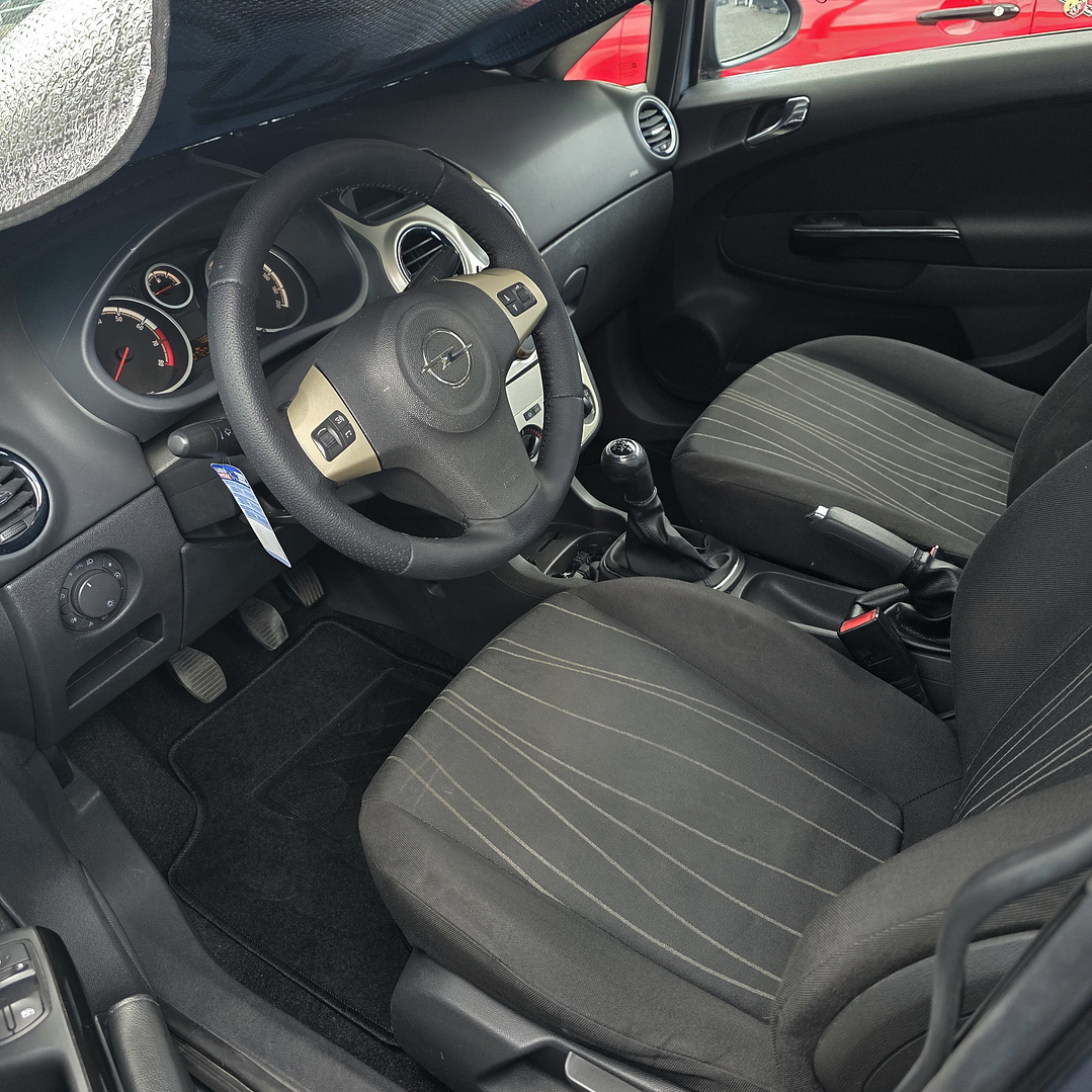 Opel Corsa D 1.2cc 7