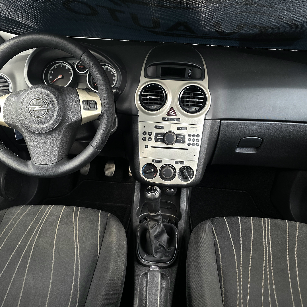 Opel Corsa D 1.2cc 11