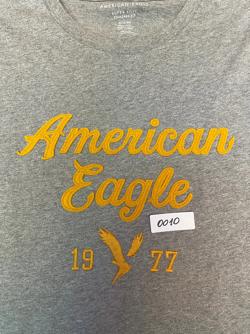 Polera Hombre American Eagle Gris Jaspeada con Estampado Talla XL 9