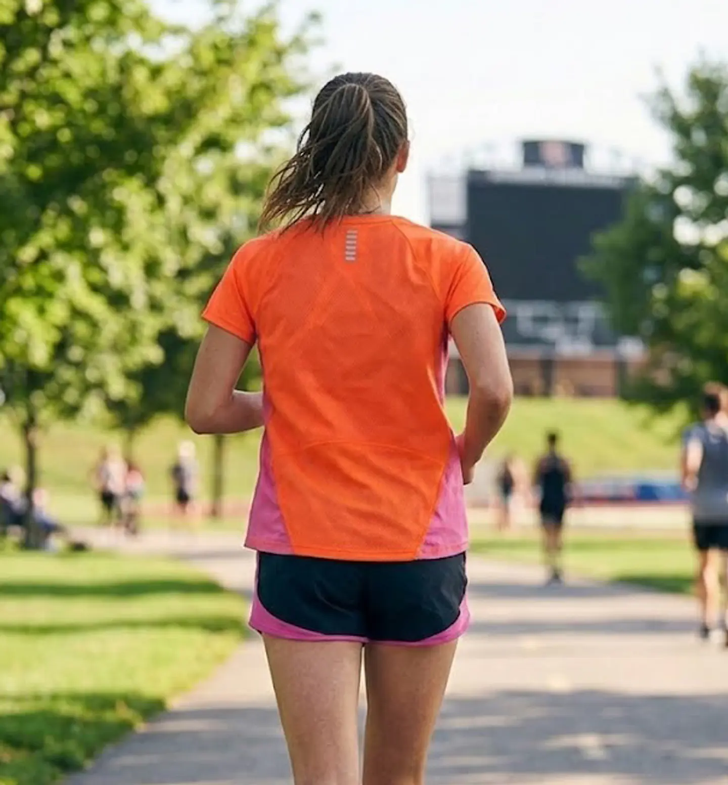 Polera Deportiva Under Armour Run Naranja, Talla S 4
