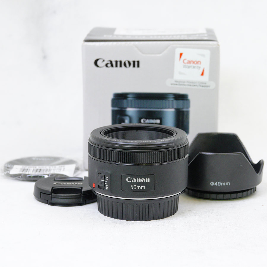 Lente Canon EF 50 mm f/1.8 STM con accesorios - Usado