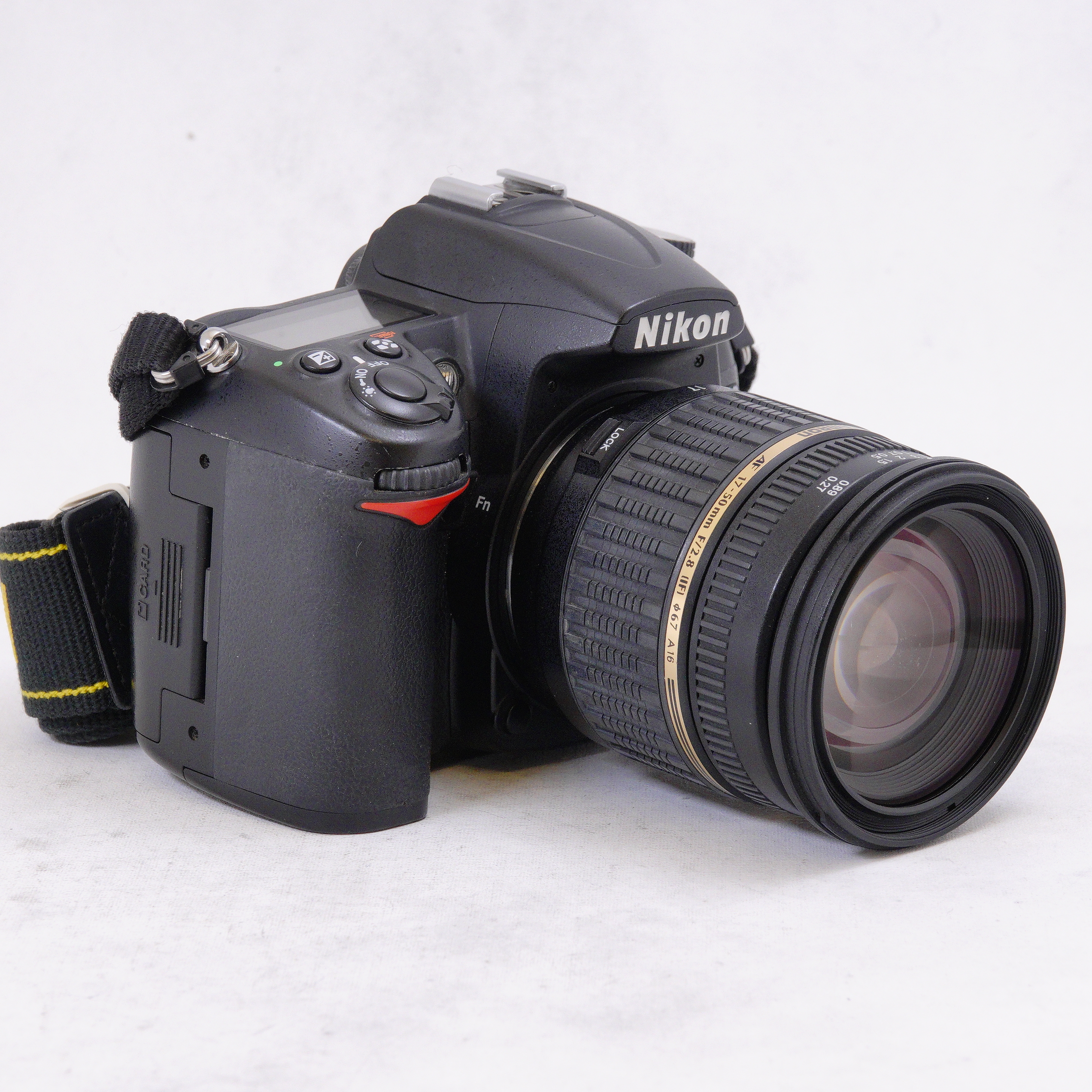 Nikon D7000 con Lente Tamron SP 17-50mm f/2.8 Di II LD Aspherical IF mas bolso - Usado