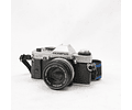 Olympus OM20 con lente Zuiko 50mm f1.8 más flash, bolso y accesorios - Usado