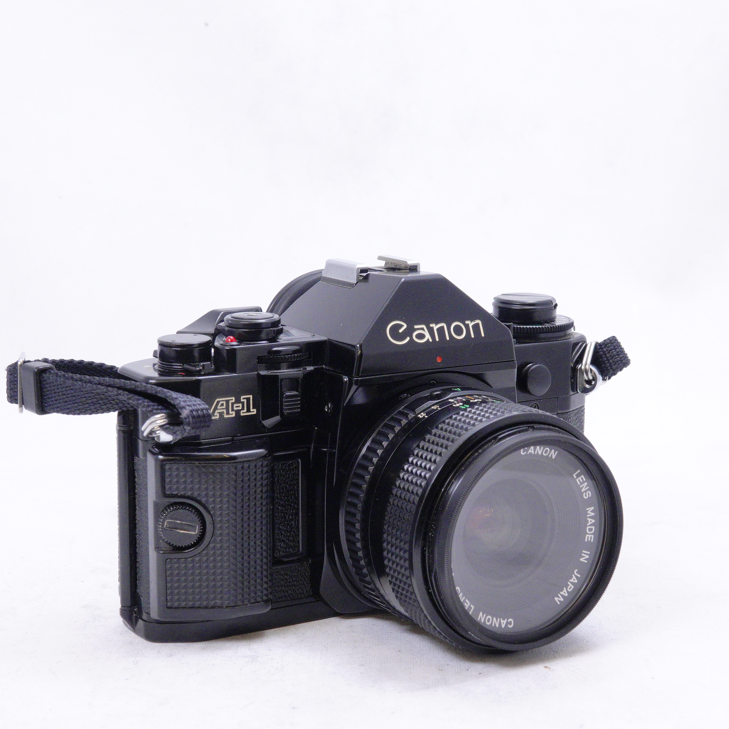 Canon A1 con Lente canon FD 28mm 2.8 y Flash - Usado