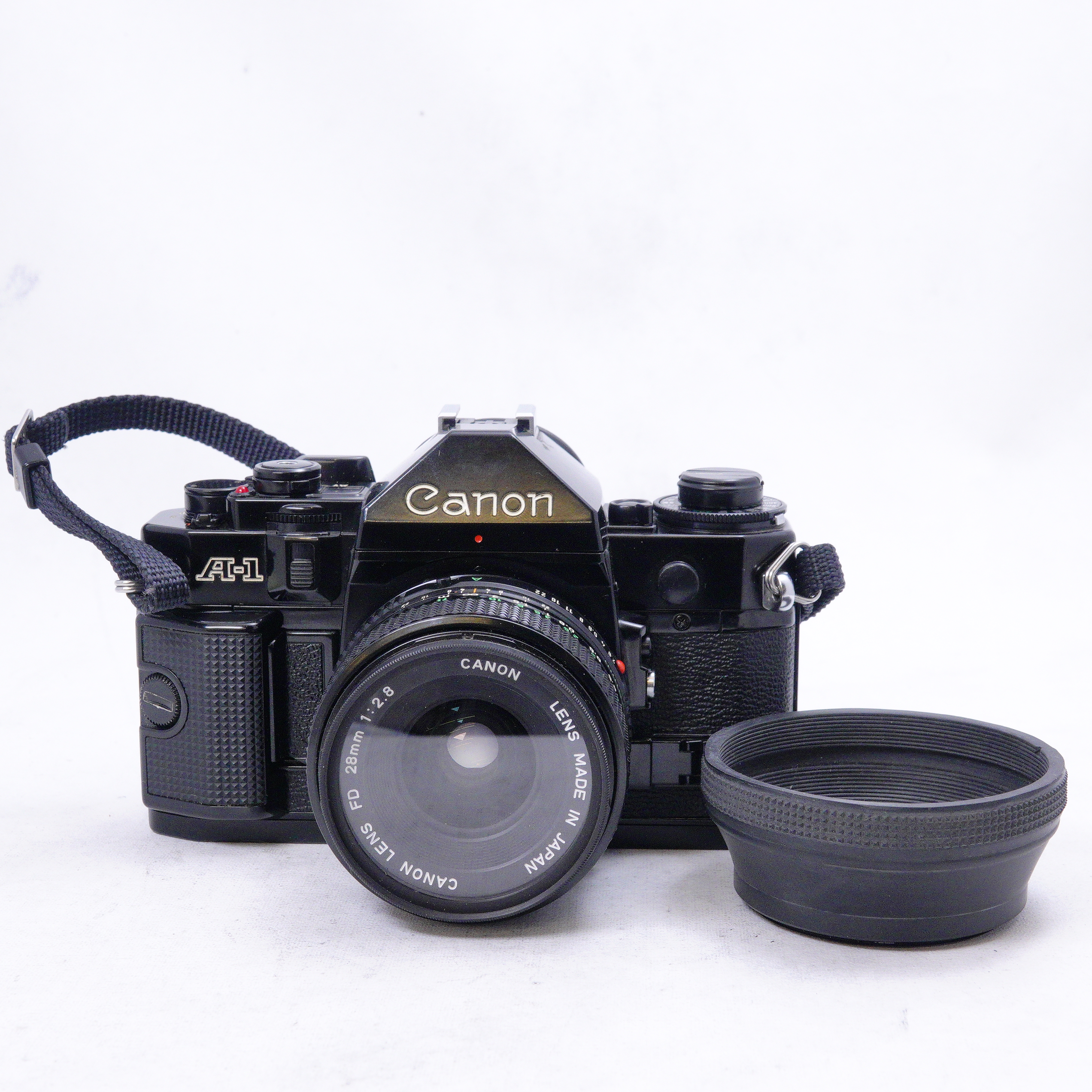Canon A1 con Lente canon FD 28mm 2.8 y Flash - Usado