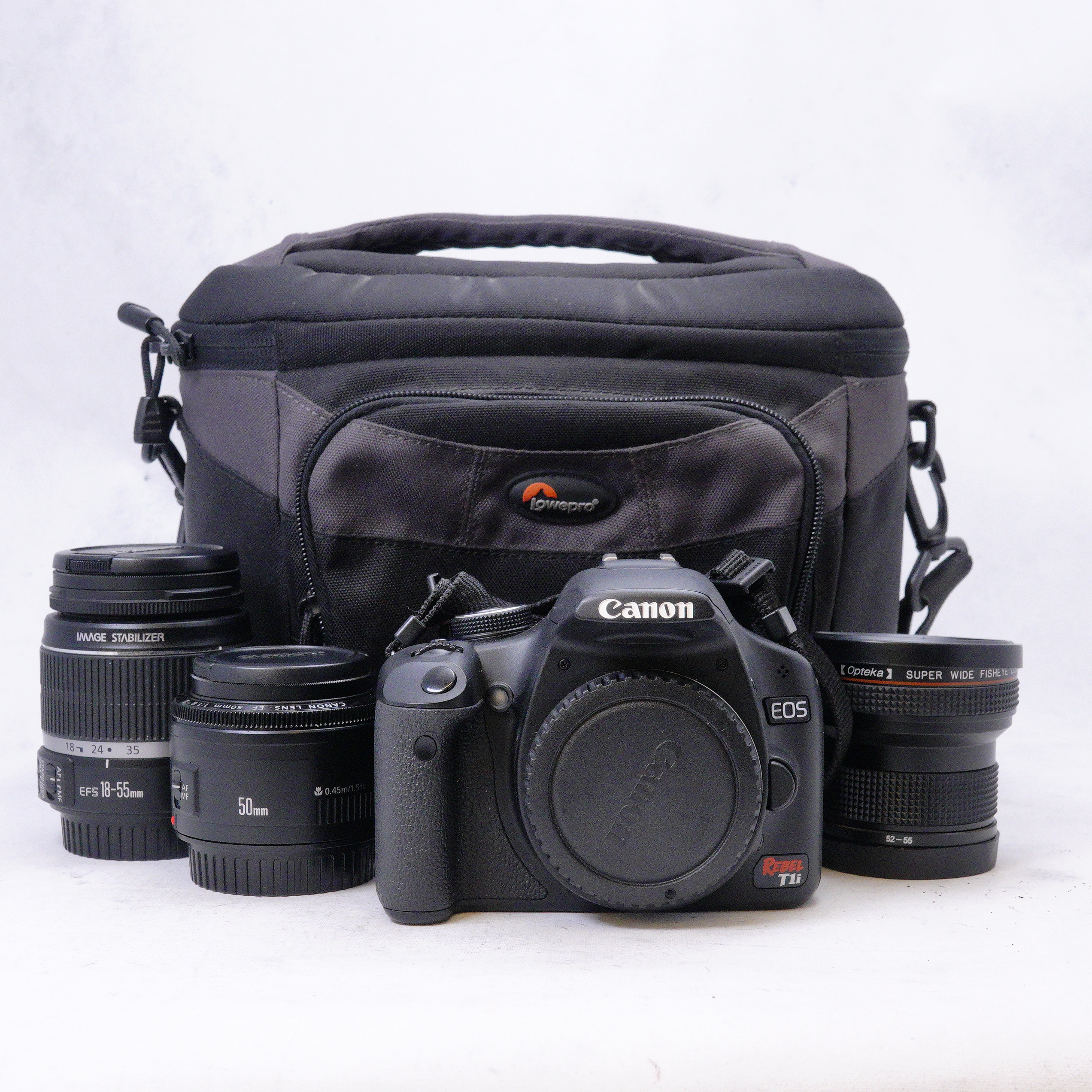 Canon EOS Rebel T1i con lente kit 18-55mm, 50mm f1.8 lentilla fish eye mas extras - Usado