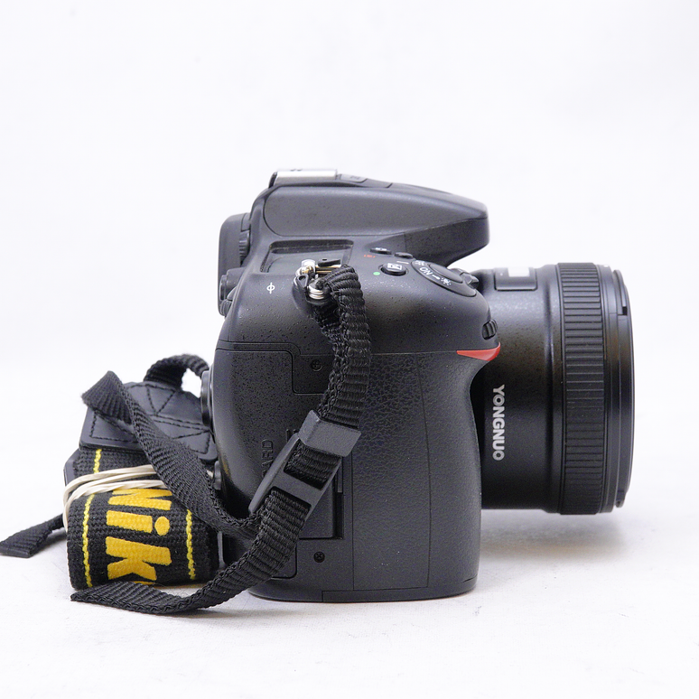 NIkon D7100 con lente Yongnuo 35mm f2 - Usado 3