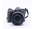 Nikon D7100 con lente de 18-140mm y accesorios - Usado
