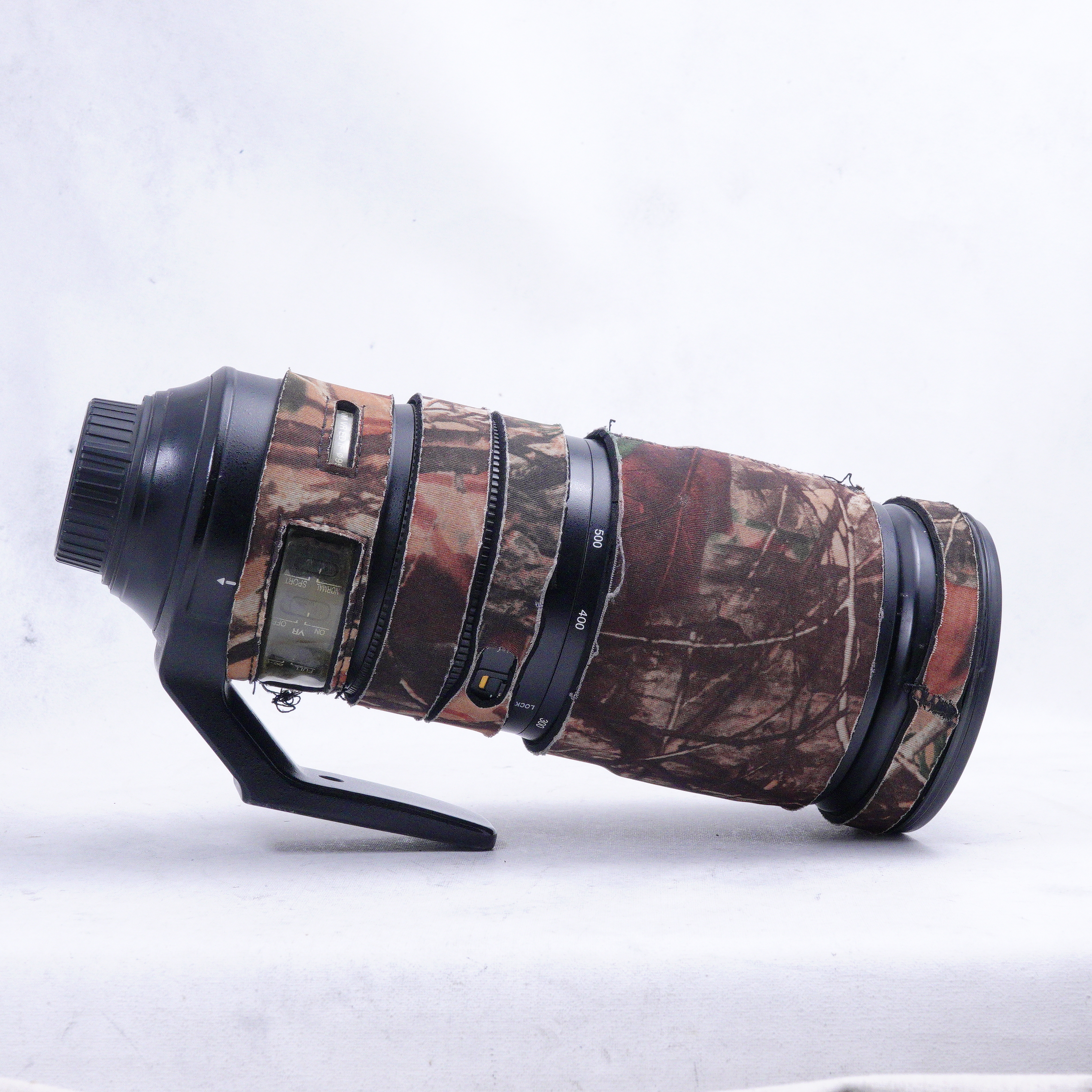 Nikon AF-S NIKKOR 200-500mm f/5.6E ED VR con skin - Usado