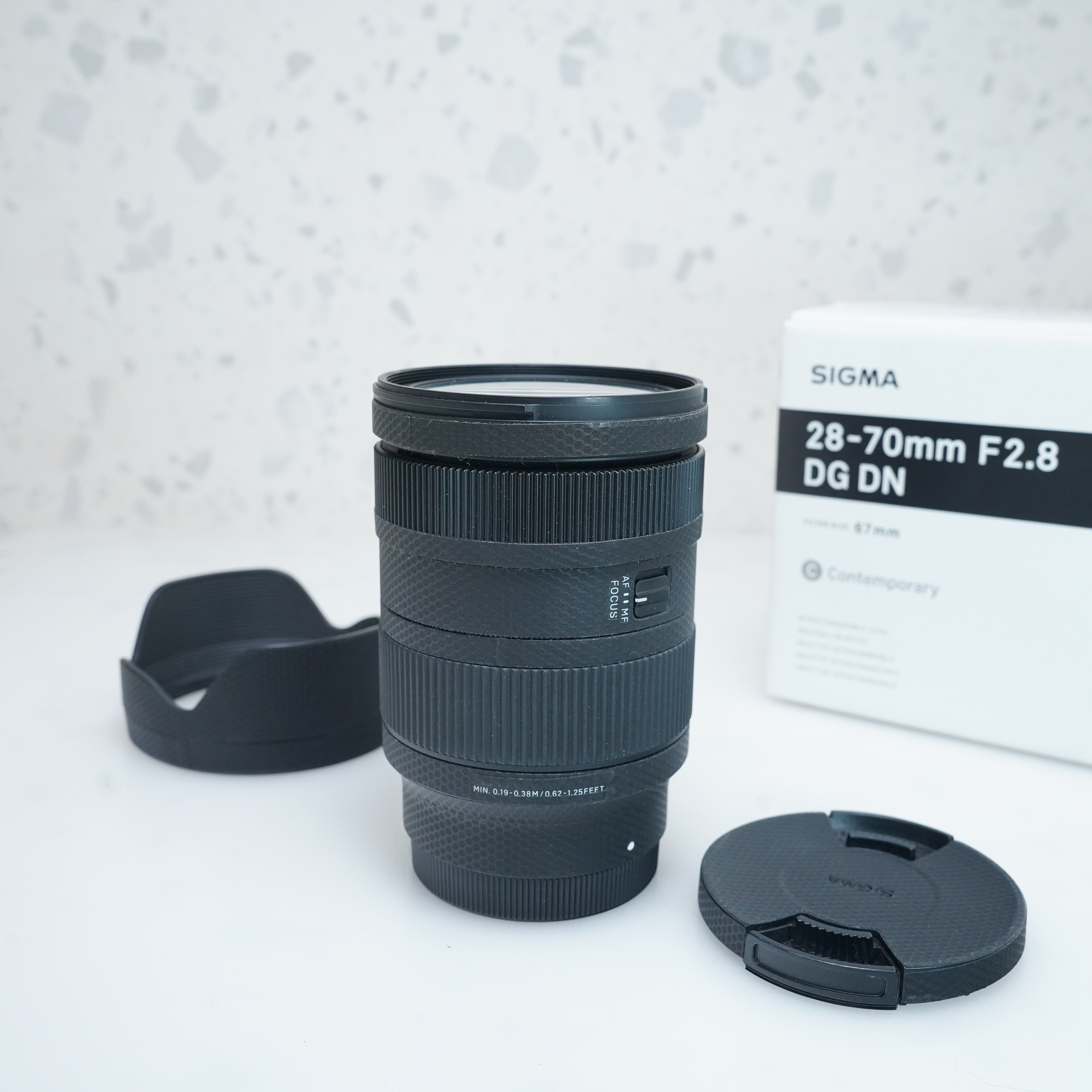 Sigma 28-70mm f/2.8 DG DN para Sony E + SKIN - USADO 