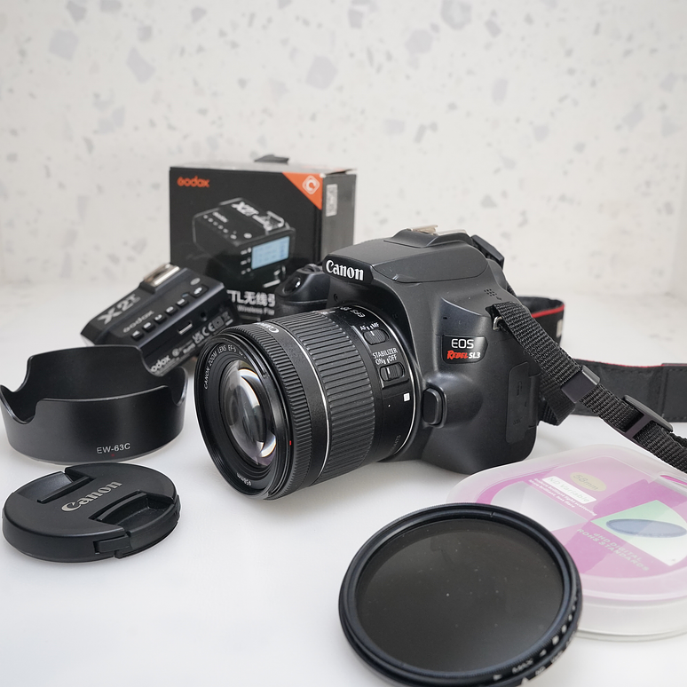 Canon SL3 + 18-55mm + reflector redondo y trigger X2T Godox 2
