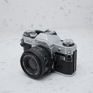 Canon AE-1 + Canon FD 50mm f/1.8 - USADO