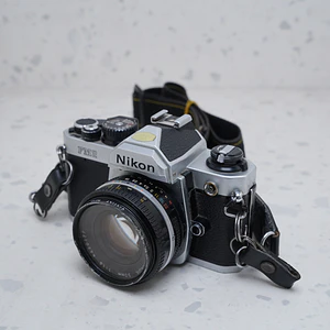 Nikon FM2 + 50m + 35-70mm - USADO