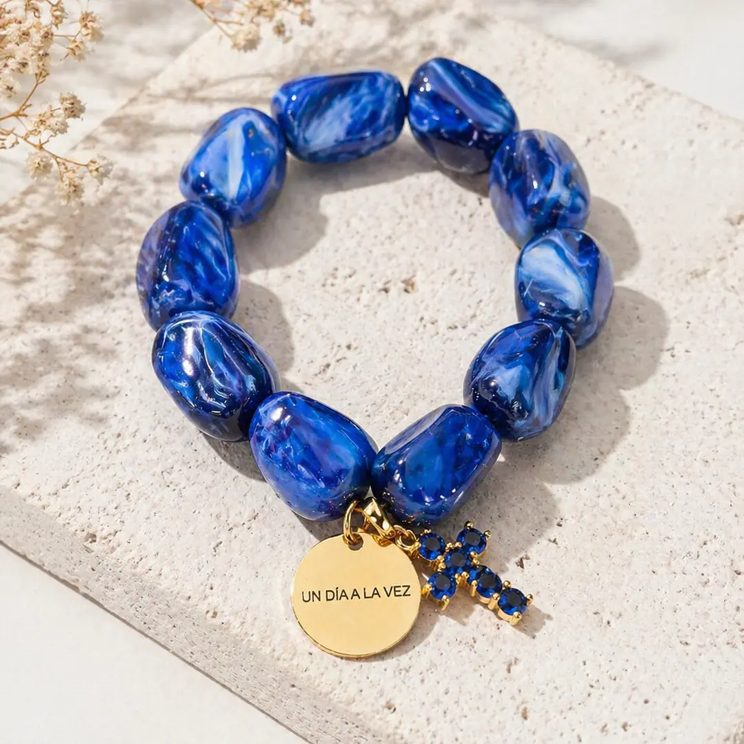 Pulsera azul cruz + frase 1