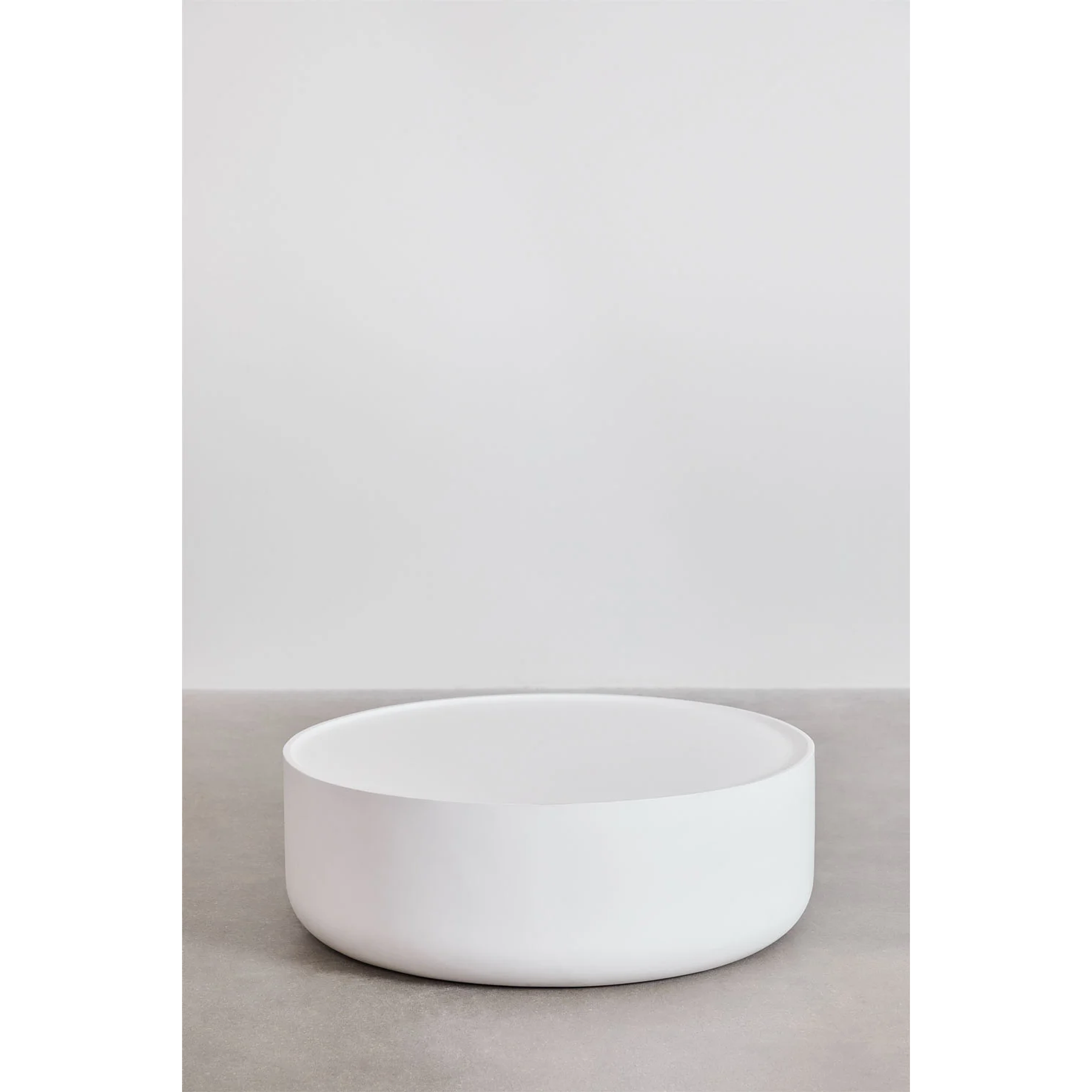 Mesa de centro redonda en cemento blanco brillante (Ø80 cm) Darwys