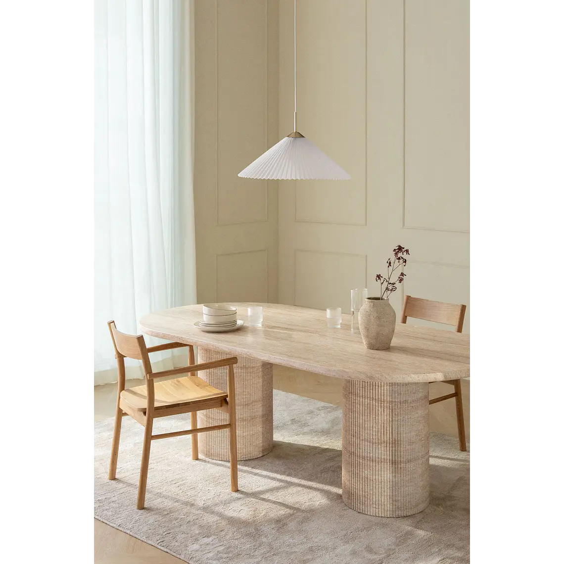 Mesa de comedor ovalada 220x100 cm en cemento look travertino 1