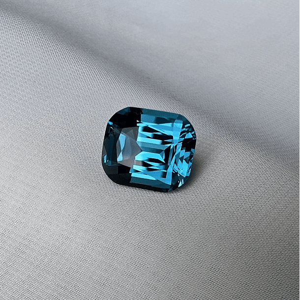 Topacio London Blue-6.90ct-12x10mm-c/cojín alargado-AAAA 
